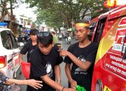 Jumat Terakhir di Bulan Ramadhan,  PNG Bagikan Ratusan Nasi Dus ke Masyarakat Pengguna Jalan
