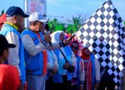 Wakil Gubernur Sultra Lepas Jalan Santai HUT Ke-63 SMANSA Kendari